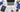 Desktop scene with a laptop, notebooks, smartphone, and coffee cup for healthcare administration tasks.